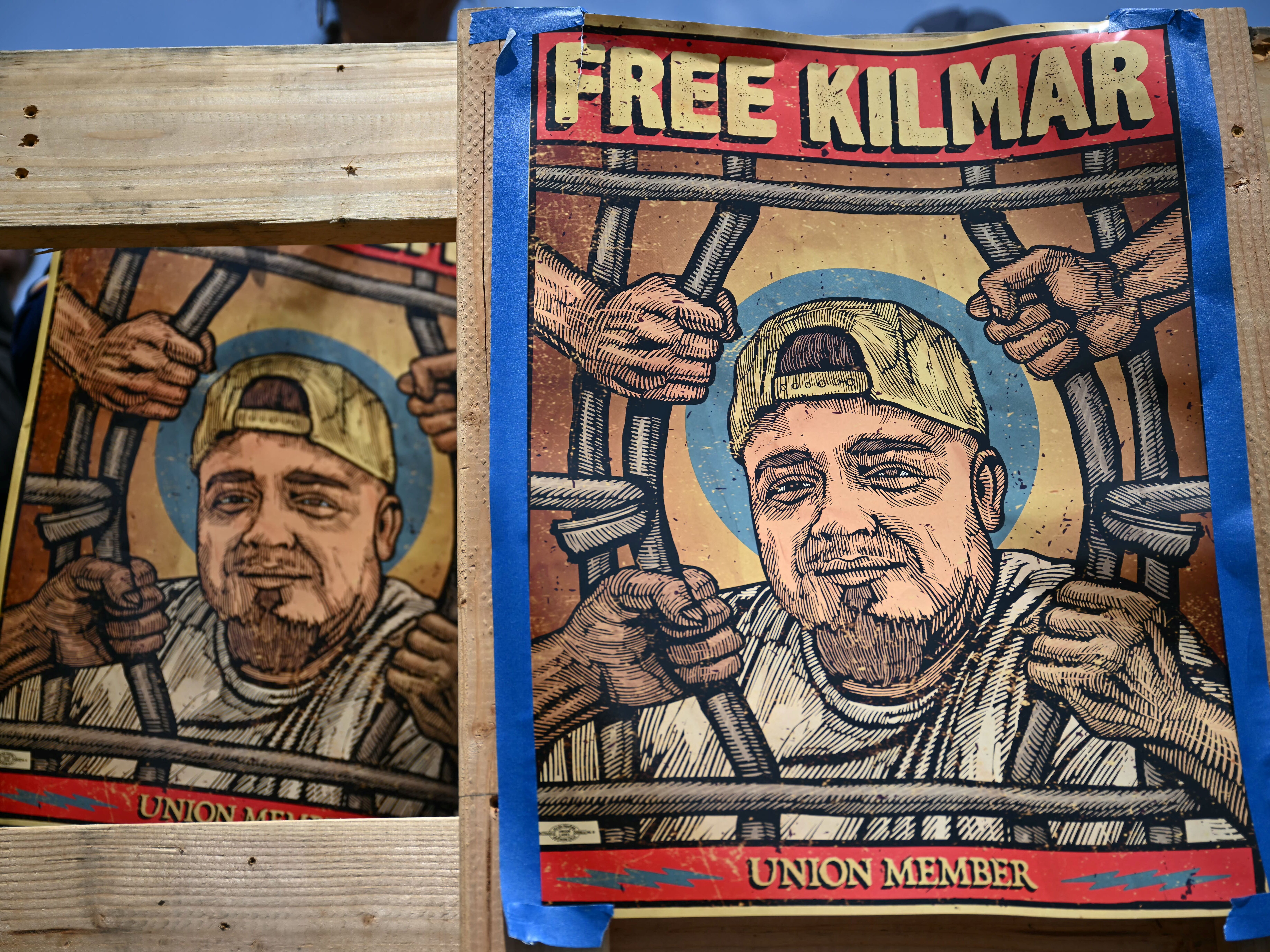 caption: Protestors call for the release of Maryland resident Kilmar Abrego Garcia, who was deported to CECOT prison in El Salvador before the administration of US President Donald Trump admitted he was sent there due to an "administrative error," at a protest in Los Angeles, California, on May 1. Since the protest, Abrego Garcia was returned to the U.S. and has been in federal prison awaiting trial for human smuggling charges.