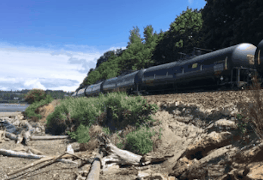 caption: An oil train rolls through Shoreline, Washington.
