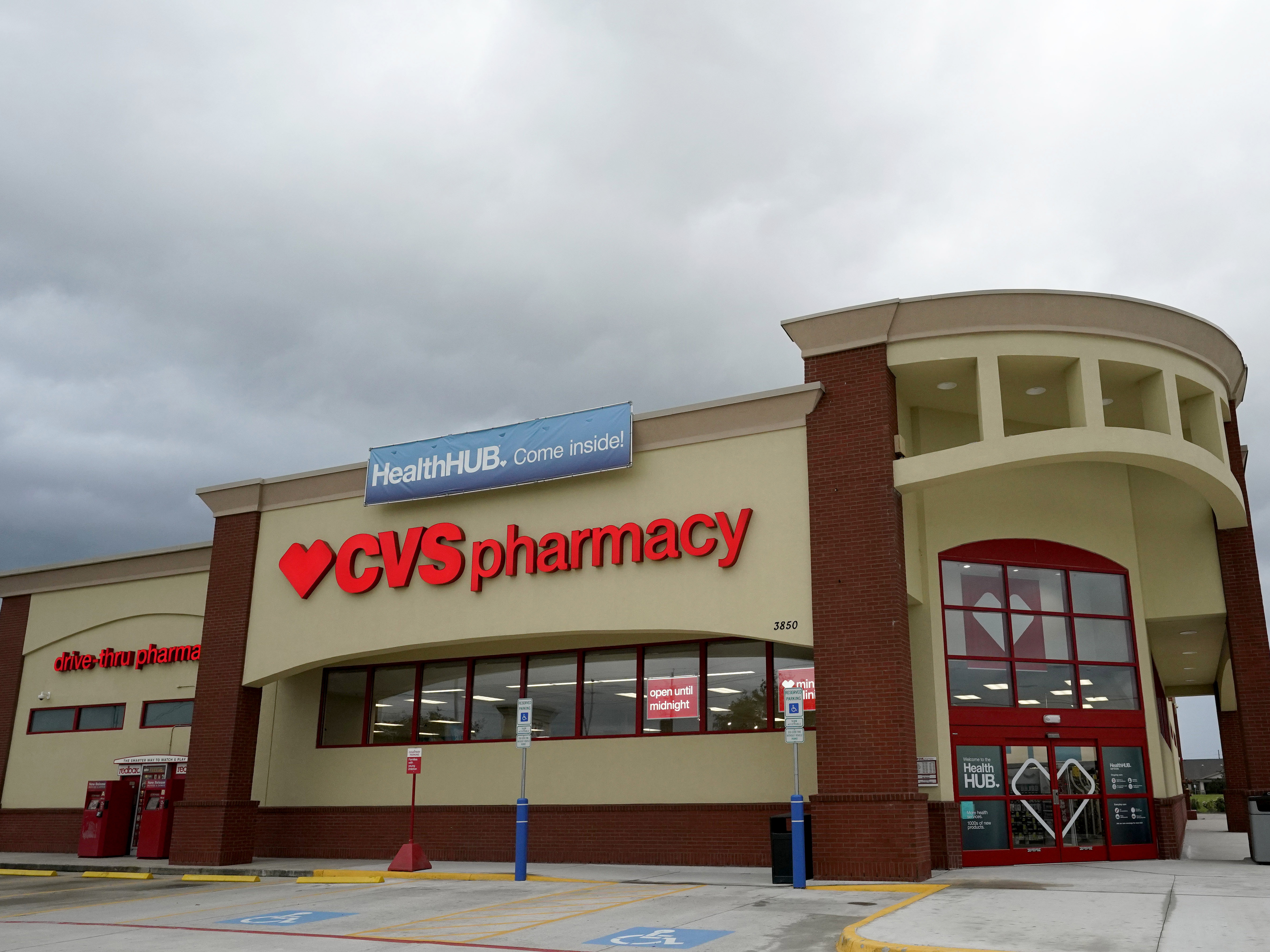 caption: "With the recent spike in COVID-19 infections, we're joining others in taking the next step and requiring all customers to wear face coverings when entering any of our stores throughout the country effective Monday, July 20," CVS officials said Thursday.