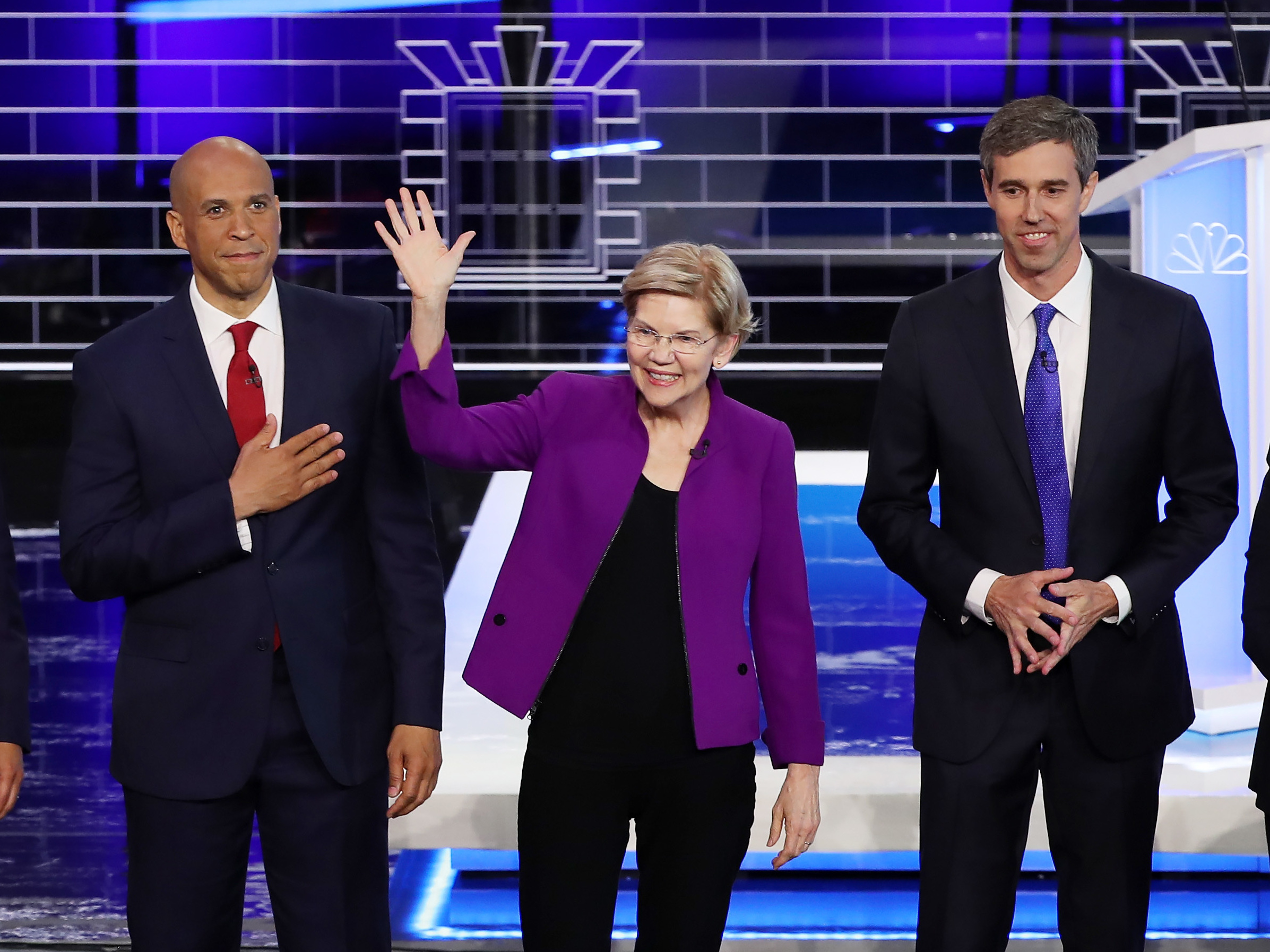 caption: On Wednesday in Miami, Democratic presidential candidates take the stage during the first night of the Democratic presidential debate. From left: former Housing and Urban Development Secretary Julián Castro, New Jersey Sen. Cory Booker, Massachusetts Sen. Elizabeth Warren, former Texas Rep. Beto O'Rourke and Sen. Amy Klobuchar of Minnesota.