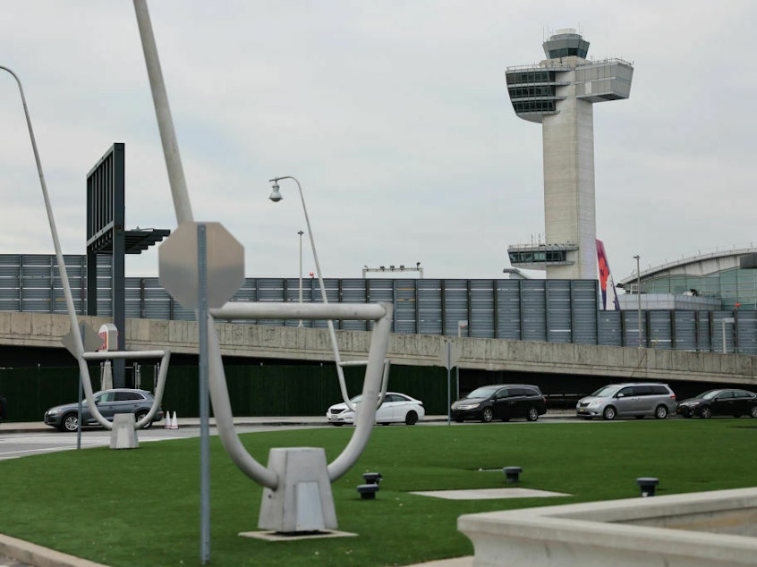 caption: The air traffic control tower at John F. Kennedy International Airport in New York City. Federal regulators are increasing the amount of required rest between shifts for air traffic controllers.
