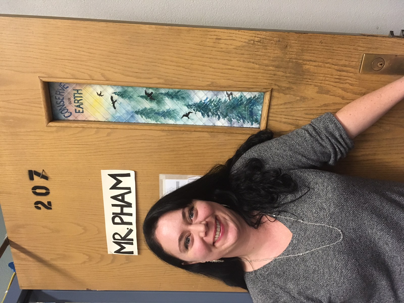 caption: Jeannette Bath is an instructional assistant at Franklin High School who creates art to cover door windows in case of an active shooter.