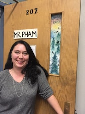 caption: Jeannette Bath is an instructional assistant at Franklin High School who creates art to cover door windows in case of an active shooter.