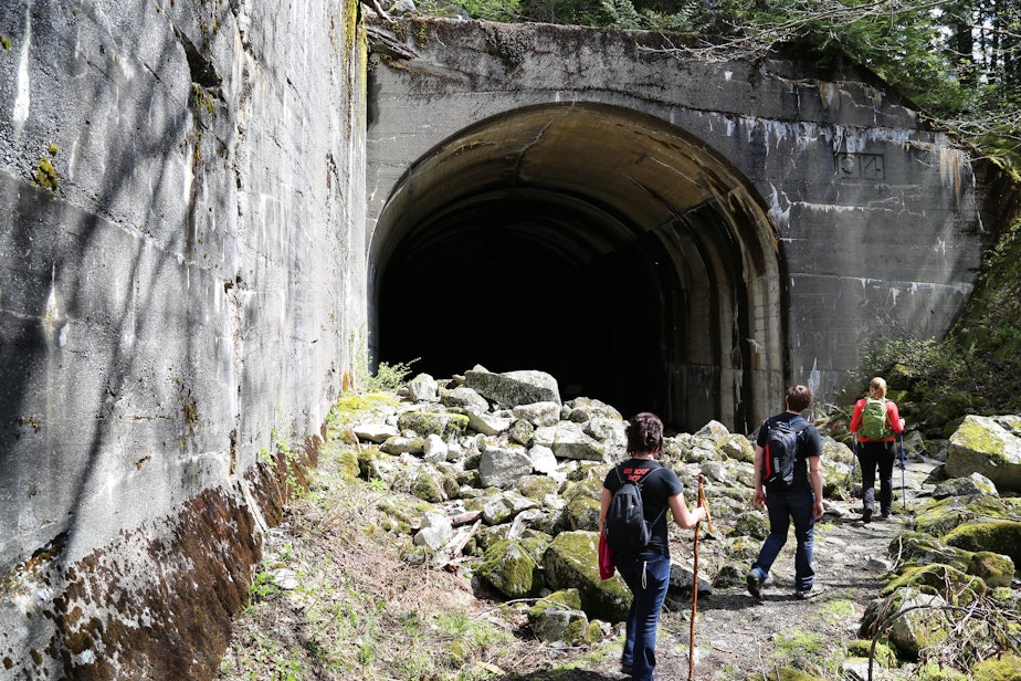 caption:  A group of hikers on the Iron Goat Trail in Washington.