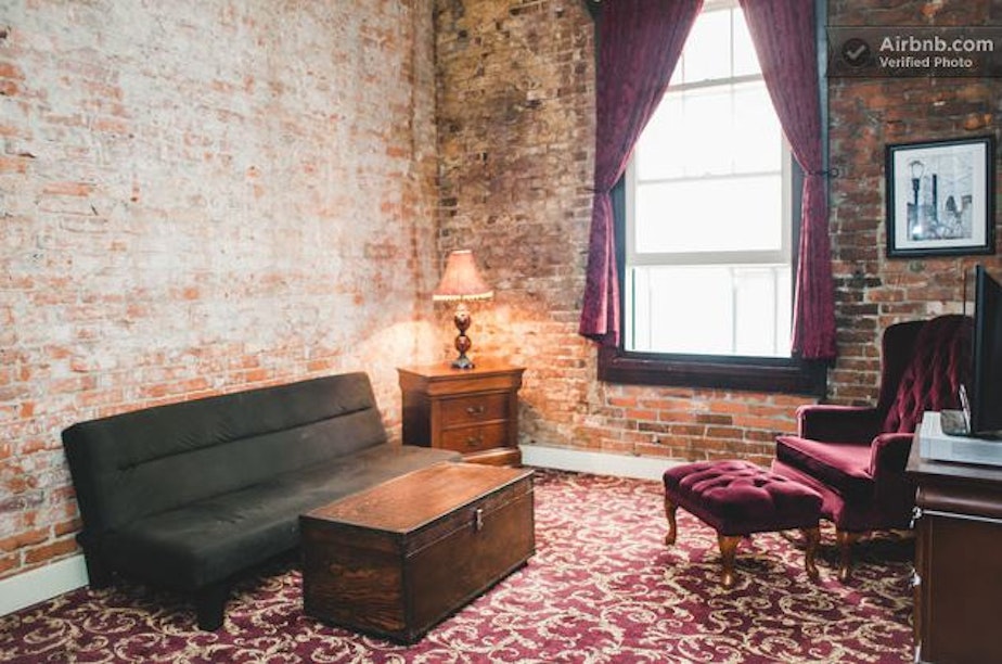 caption: Pioneer Square apartment listed at $130/night on Airbnb.
