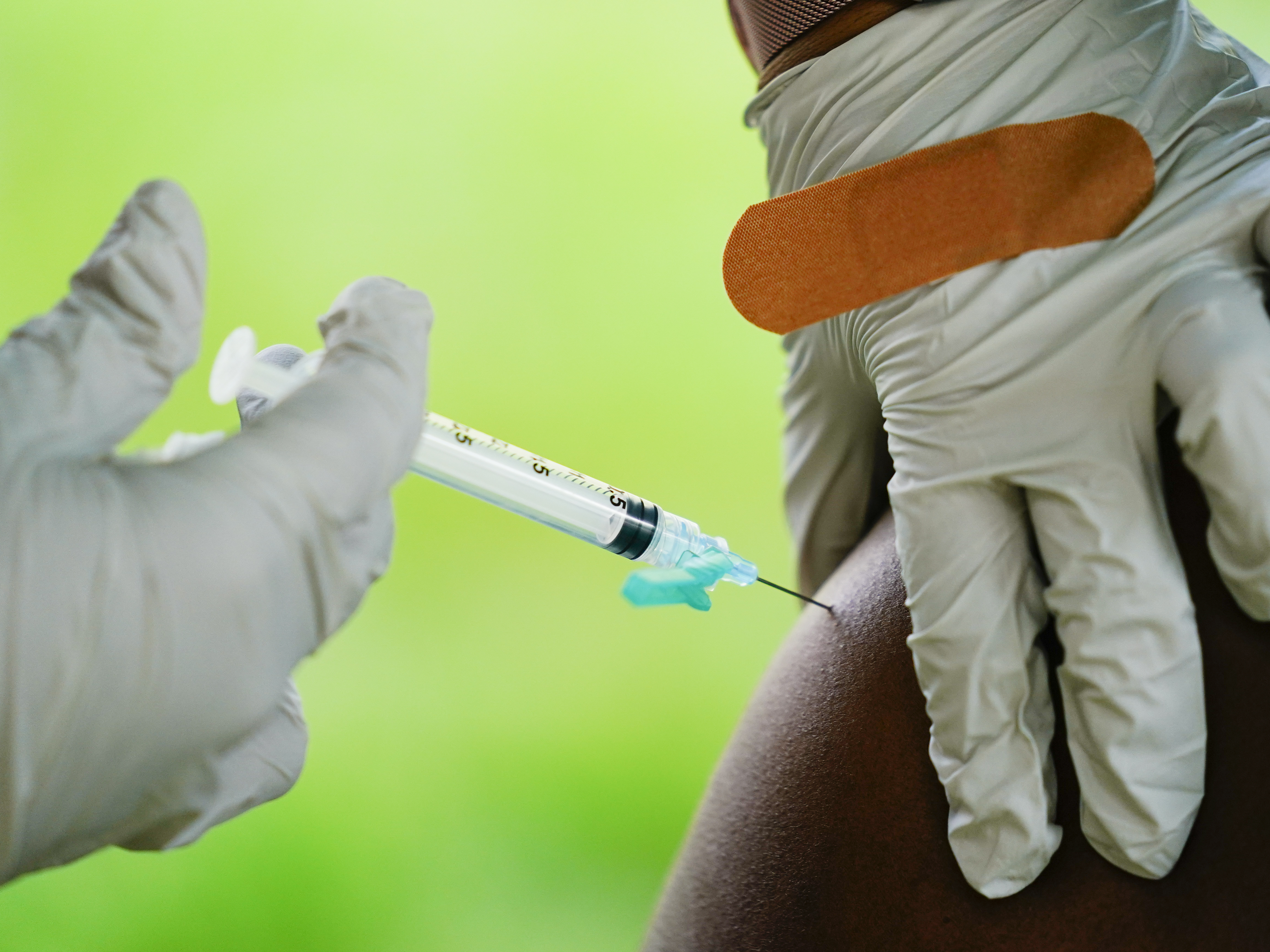 caption: A CDC advisory panel recommended an extra Pfizer COVID-19 vaccine dose only for those who are 65 or older or run a high risk of severe disease.