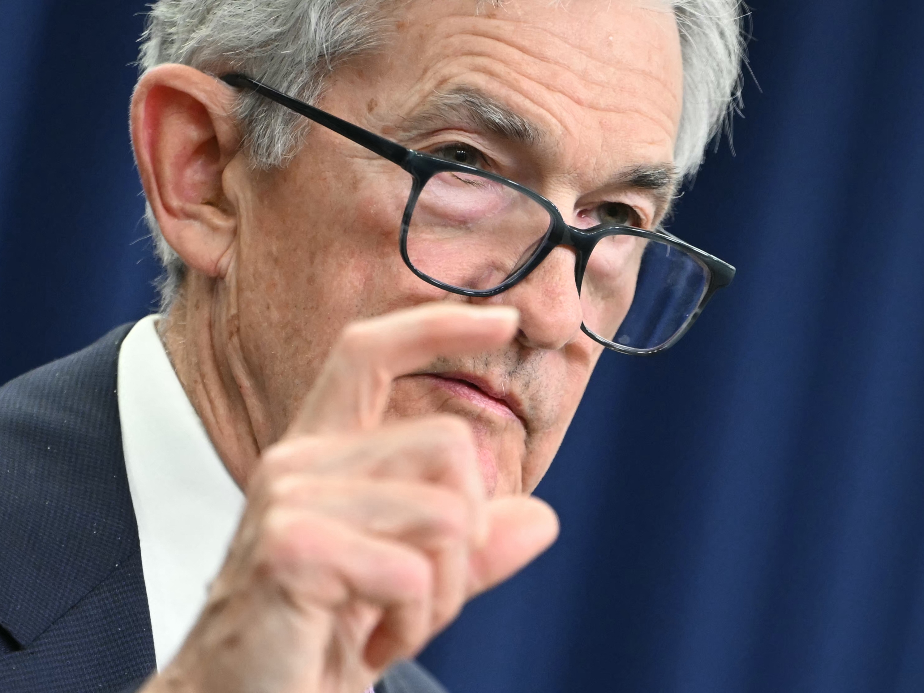 caption: Federal Reserve chairman Jerome Powell and his colleagues lowered their benchmark interest rate Wednesday by a quarter percentage point. That will make it cheaper to get a car loan, finance a business or carry a balance on your credit card.