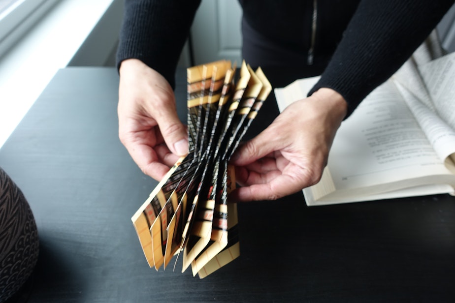 caption: Folded paper by artist Byron Au Yong.