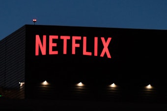 caption: The Netflix logo is seen on the company's building on Sunset Boulevard in Los Angeles. The streaming giant is one of many platforms that contributed to streaming outperforming both broadcast and cable in TV viewership numbers for July.