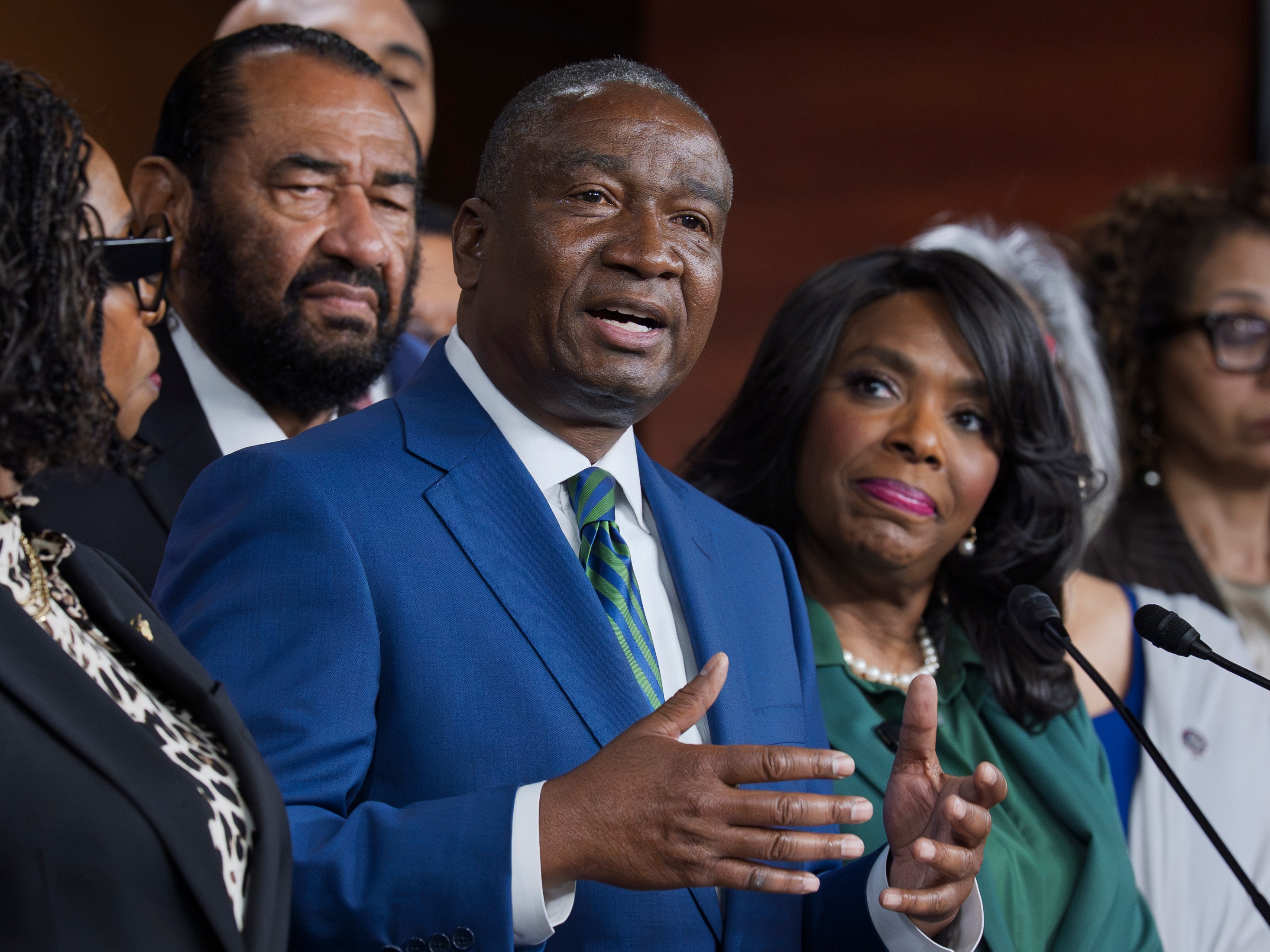caption: Democratic Rep. Cleo Fields is seen with members of the Congressional Black Caucus on Wednesday at the Capitol. Fields represents the Louisiana congressional district at the heart of the U.S. Supreme Court's ruling on Wednesday to severely weaken the Voting Rights Act.