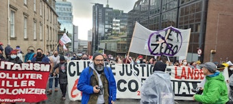 caption: Edgar Franks at a climate justice march during COP26 in Glasgow, Scotland
