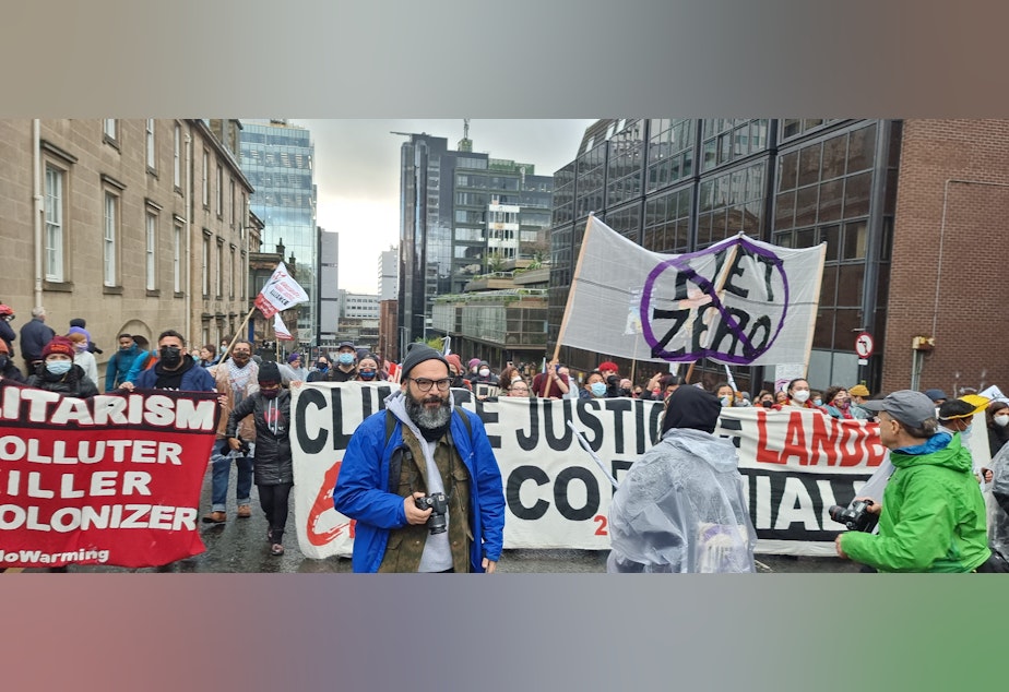 caption: Edgar Franks at a climate justice march during COP26 in Glasgow, Scotland
