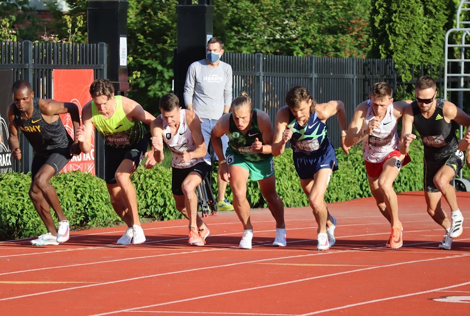 caption: Portland-based Nike runner Craig Engels, at center right in dark blue shorts, won the 1500 meter race at the 2021 Portland Track Festival, a tune up for U.S. Olympic Team Trials.