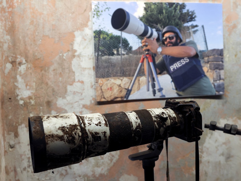 caption: The camera that belonged to Reuters journalist Issam Abdallah, who was killed by what a Reuters investigation has found was an Israeli tank crew, is displayed during a press conference by Amnesty International and Human Rights Watch in Beirut, Lebanon, on Thursday.