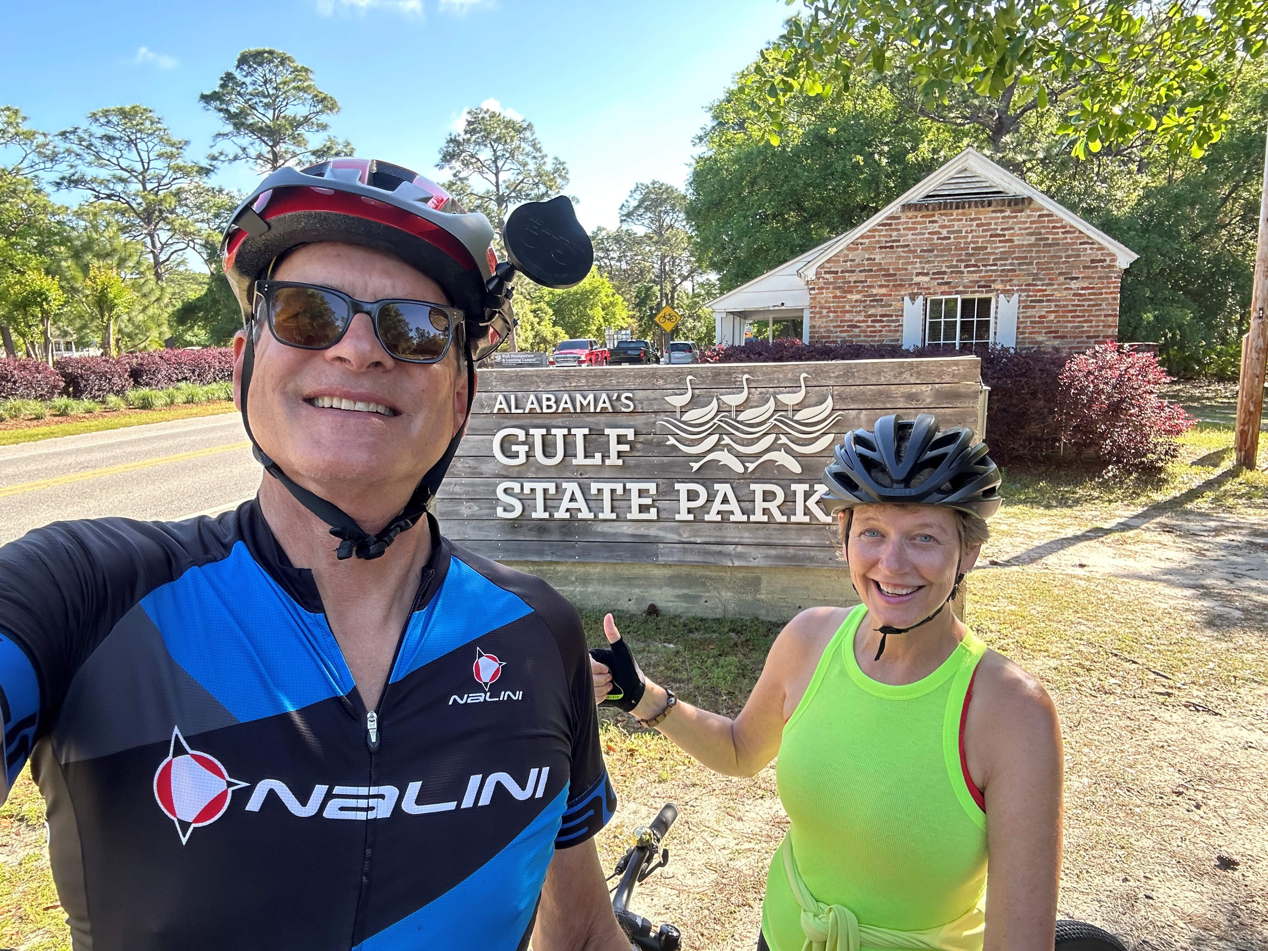 caption: On his long bike ride from St. Augustine, Fla., to New Orleans, John Burnett was often joined by his wife Margaret Justus, who pedaled part of the route and drove a support vehicle the rest of the way.