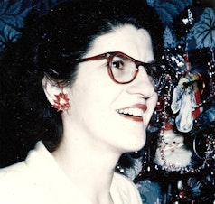 caption: Georgie, age 35, wearing her favorite Christmas earrings.