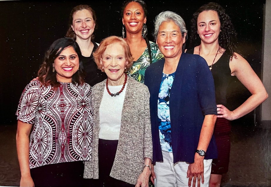 caption: Former First Lady Rosalynn Carter poses with 2018-2019 Rosalynn Carter Mental Health Journalism Fellows, including KUOW's Deborah Wang, second from right.