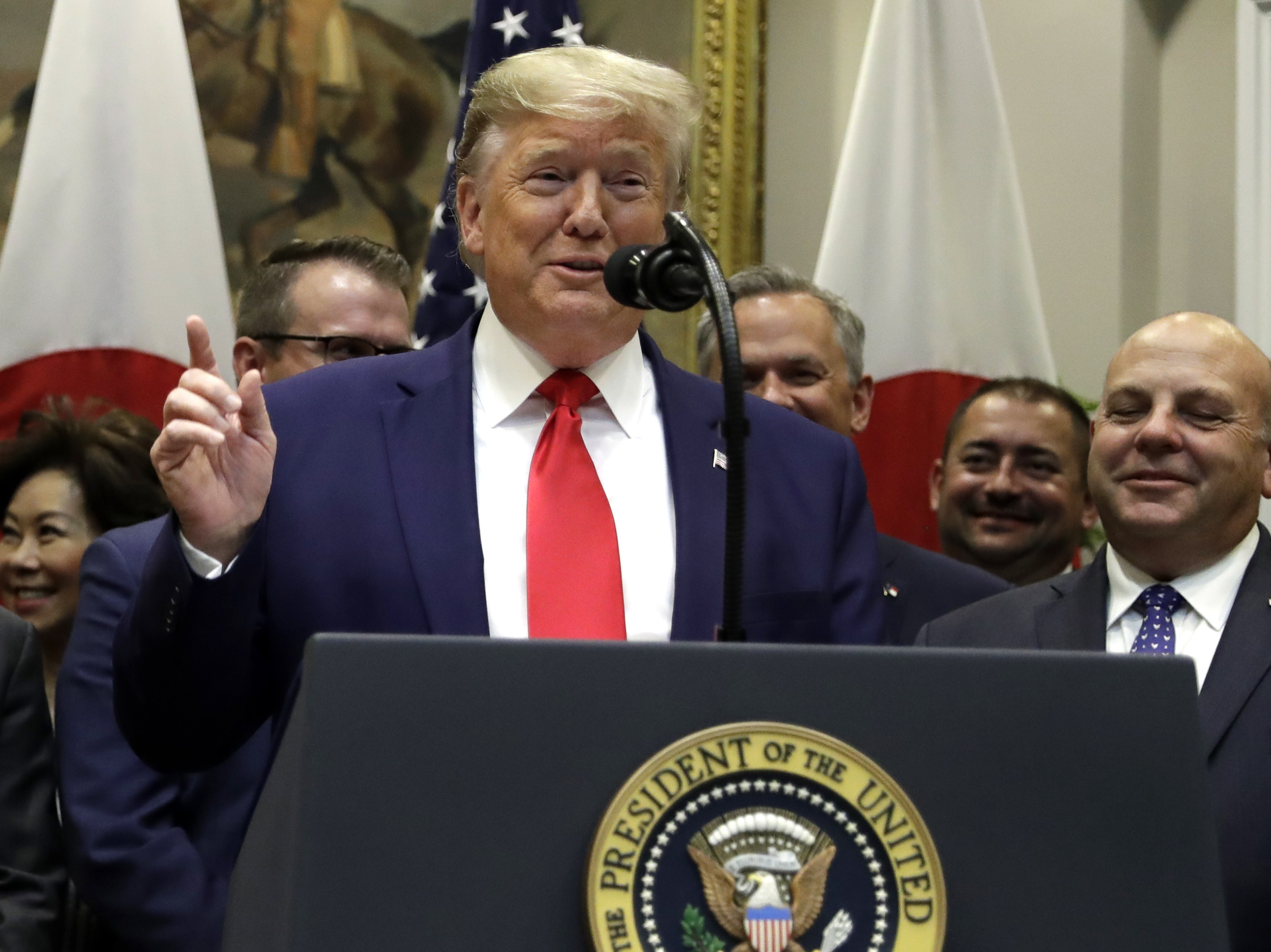 caption: A temporary stay of decision on Monday means that President Trump can hold on to his tax records for the time being. Above, he speaks before signing a trade agreement with Japan later on Monday.