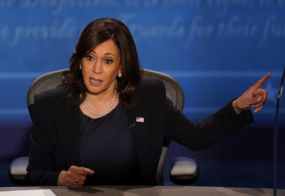 caption: Democratic vice presidential candidate Sen. Kamala Harris responds to Vice President Pence during Wednesday's debate in Salt Lake City.
