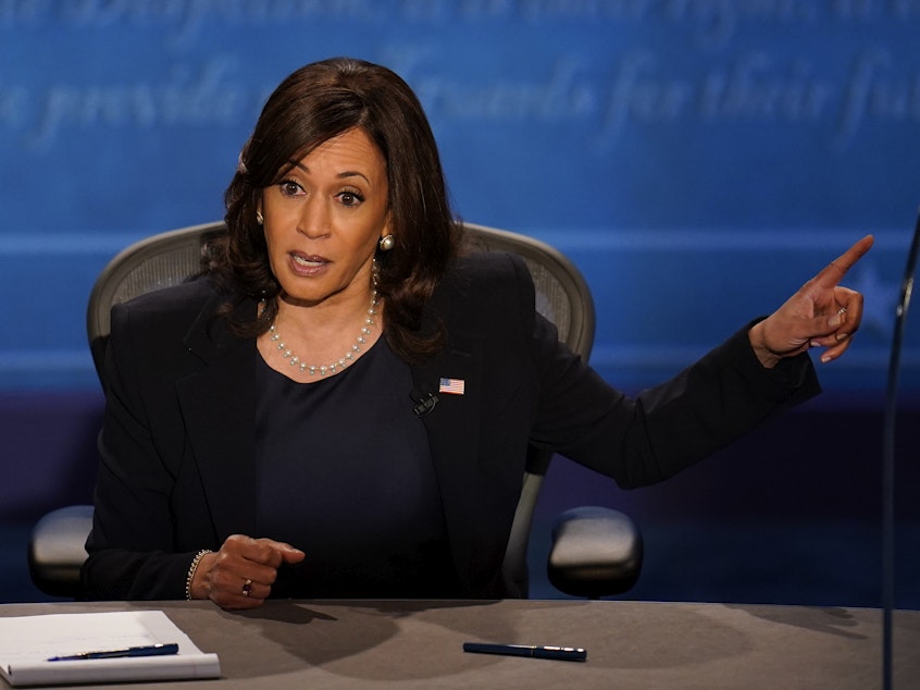 caption: Democratic vice presidential candidate Sen. Kamala Harris responds to Vice President Pence during Wednesday's debate in Salt Lake City.