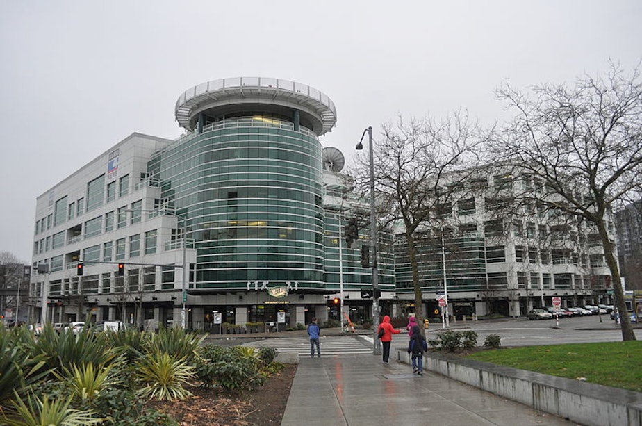 caption: Fisher Plaza, KOMO's headquarters, on a particularly rainy Seattle day. 