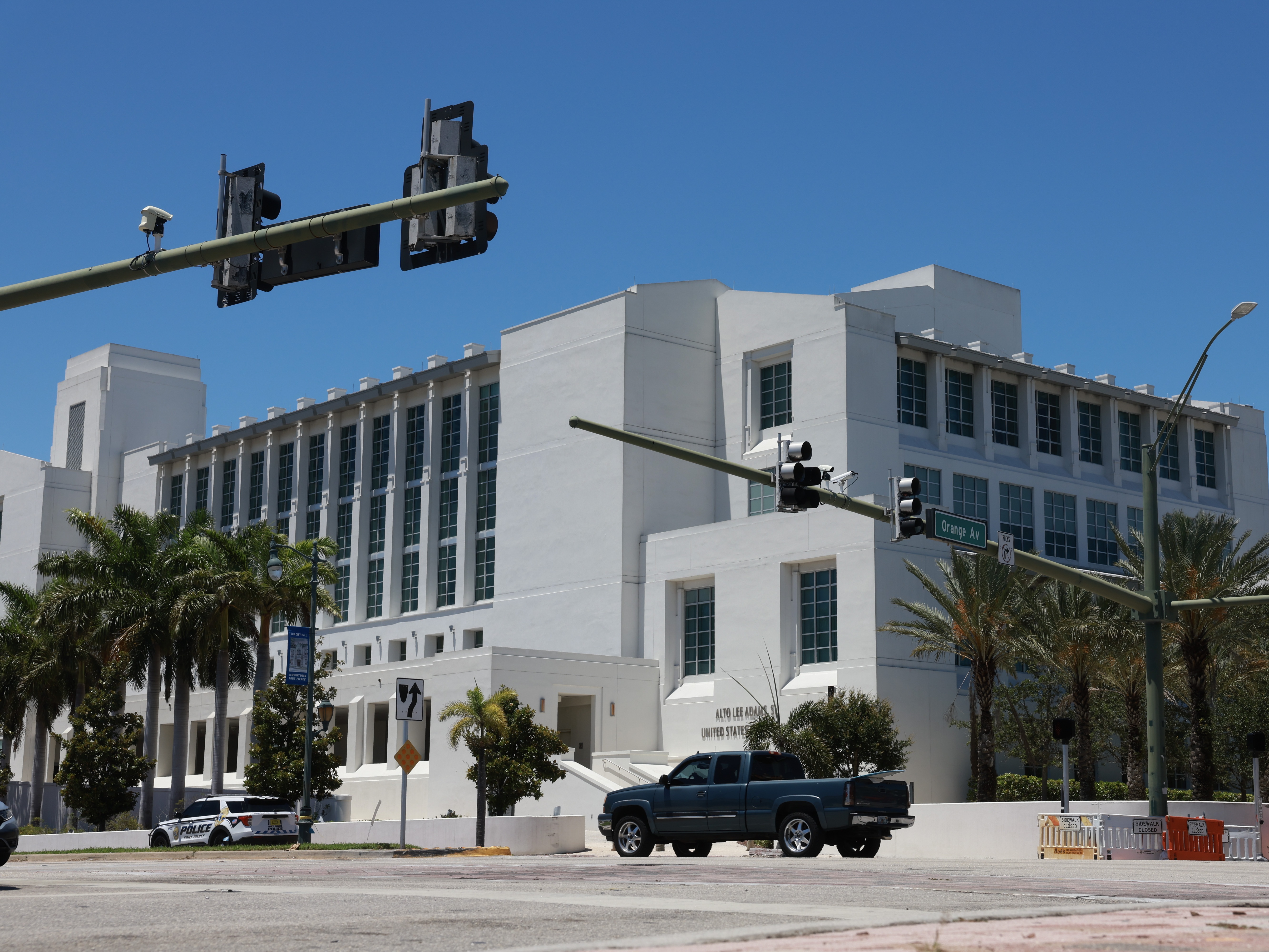 caption: Ryan Routh, the man accused in a 2024 assassination attempt of Donald Trump at a West Palm Beach, Fla. golf course, had a federal court hearing Wednesday in Fort Pierce, Fla. In this file photo of the Alto Lee Adams Sr. United States Courthouse, attorneys argued several merits of the case — including what can and can't be used in the trial.