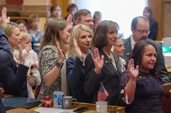 caption: The five newly elected women, all Democrats, who helped their party regain control of the Senate: Jessie Danielson (from left), holding daughter Isabelle Beth Kabza; Kerry Donovan, Brittany Pettersen, Tammy Story and Faith Winter.