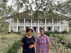 caption: Jo (left), Joy Banner and their parents fled to the Big House on the Whitney Plantation to ride out Hurricane Ida last Sunday. They say their enslaved ancestors helped build the house.