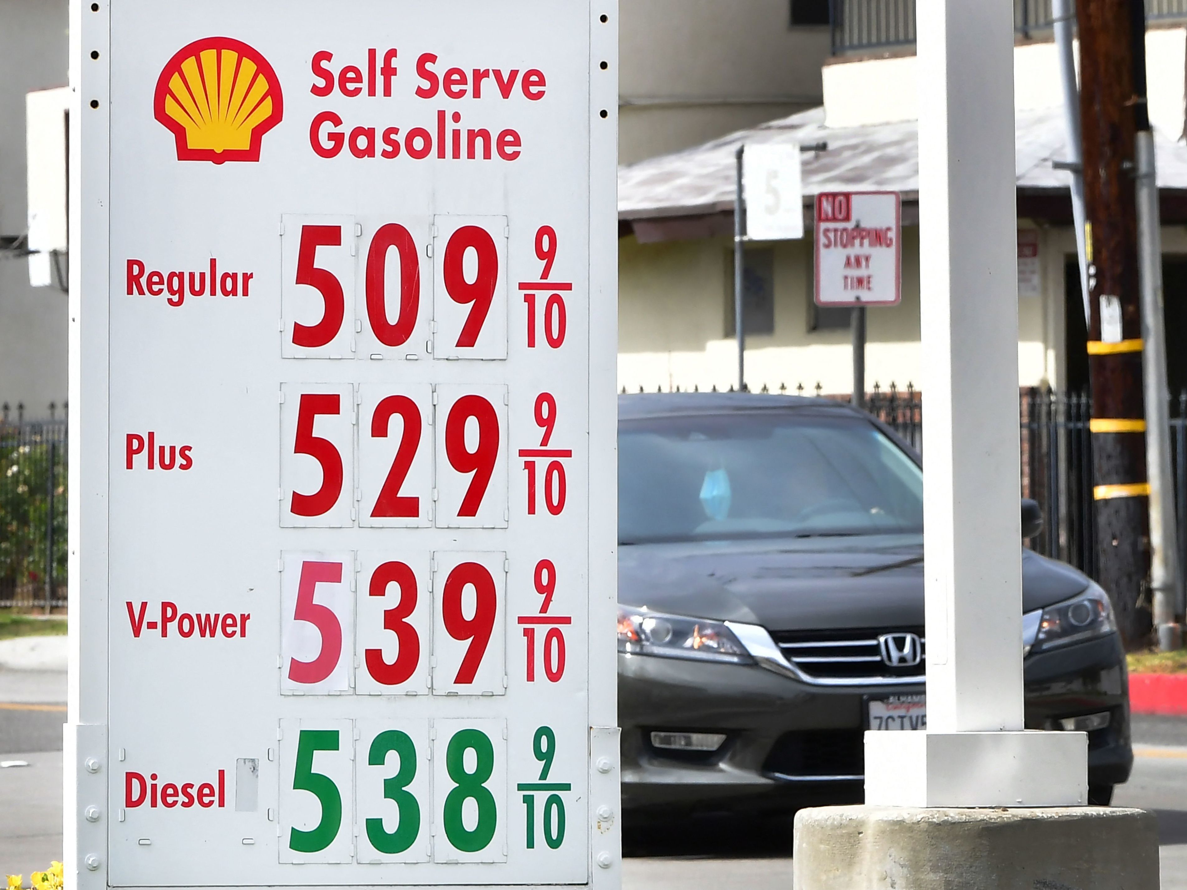 caption: A sign displays gas prices over $5 a gallon at a petrol station in Los Angele on March 4. Overall, gasoline prices have jumped by 45 cents a gallon in the last week, to a national average of $4.
