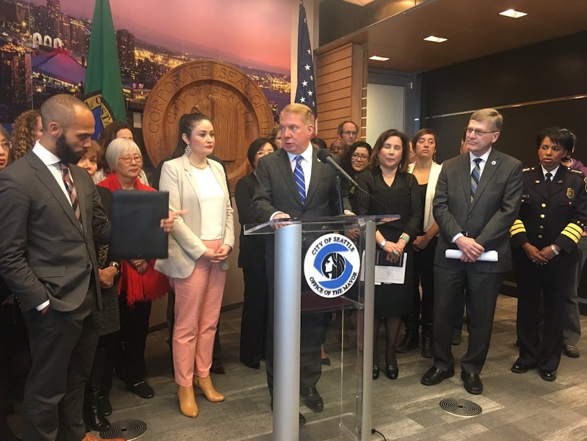 caption: Seattle Mayor Ed Murray announces a lawsuit against the Trump administration on March 29, 2017.