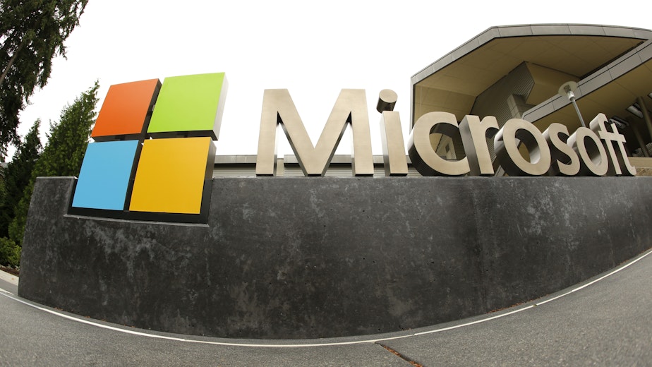 caption: This July 3, 2014, file photo, shows the Microsoft Corp. logo outside the Microsoft Visitor Center in Redmond, Wash. 