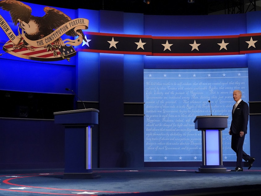 caption: Then-candidate Joe Biden walks on stage to begin the first presidential debate in September 2020. The 2020 faceoffs may be the last of their kind.