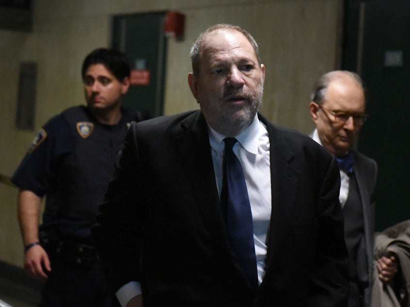 caption: Harvey Weinstein exits the courtroom after a hearing in State Supreme Court on April 26 in New York. The Hollywood producer reportedly reached a $44 million deal to resolve a series of lawsuits and compensate women who accused him of sexual misconduct.