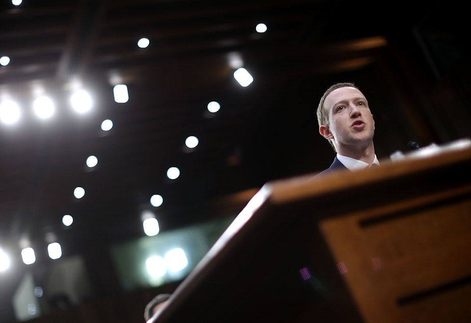 caption: Facebook CEO Mark Zuckerberg testifies before a Senate panel in April 2018. On Wednesday, Facebook's independent Oversight Board is set to decide whether the company should keep its indefinite ban on former President Donald Trump.