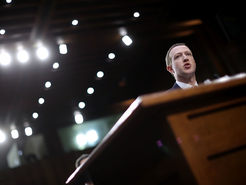 caption: Facebook CEO Mark Zuckerberg testifies before a Senate panel in April 2018. On Wednesday, Facebook's independent Oversight Board is set to decide whether the company should keep its indefinite ban on former President Donald Trump.