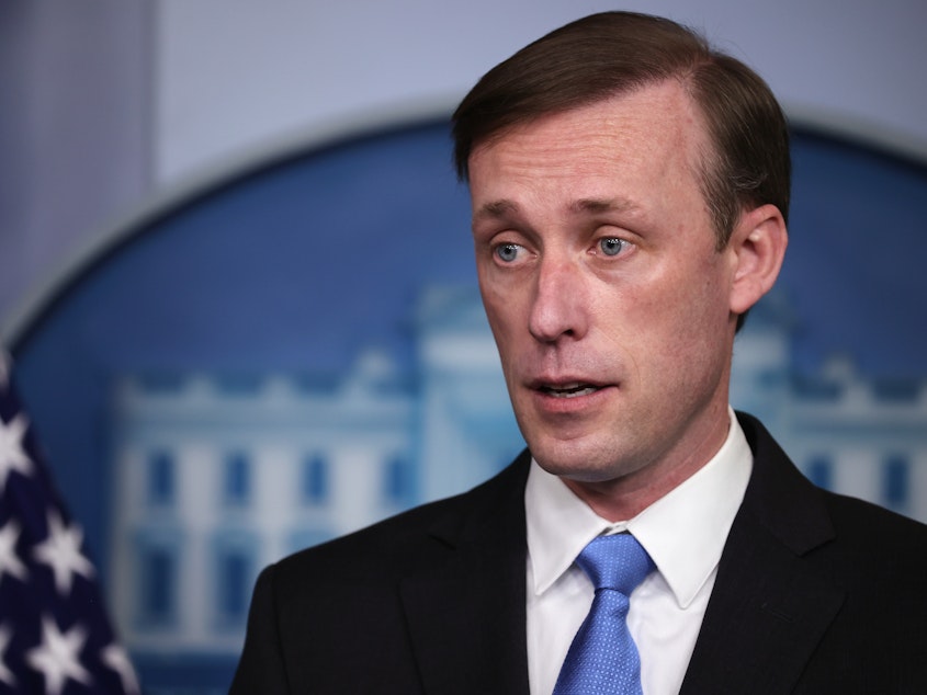 caption: White House national security adviser Jake Sullivan, seen here during a press briefing on Feb. 4, told CBS the World Health Organization has more work to do to get to the bottom of where the coronavirus emerged.