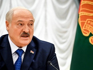 caption: Belarus President Alexander Lukashenko says that Wagner chief Yevgeny Prigozhin is still in Russia. Lukashenko is seen here at his residence, the Independence Palace, in the capital Minsk on Thursday.