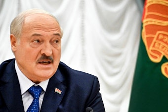 caption: Belarus President Alexander Lukashenko says that Wagner chief Yevgeny Prigozhin is still in Russia. Lukashenko is seen here at his residence, the Independence Palace, in the capital Minsk on Thursday.