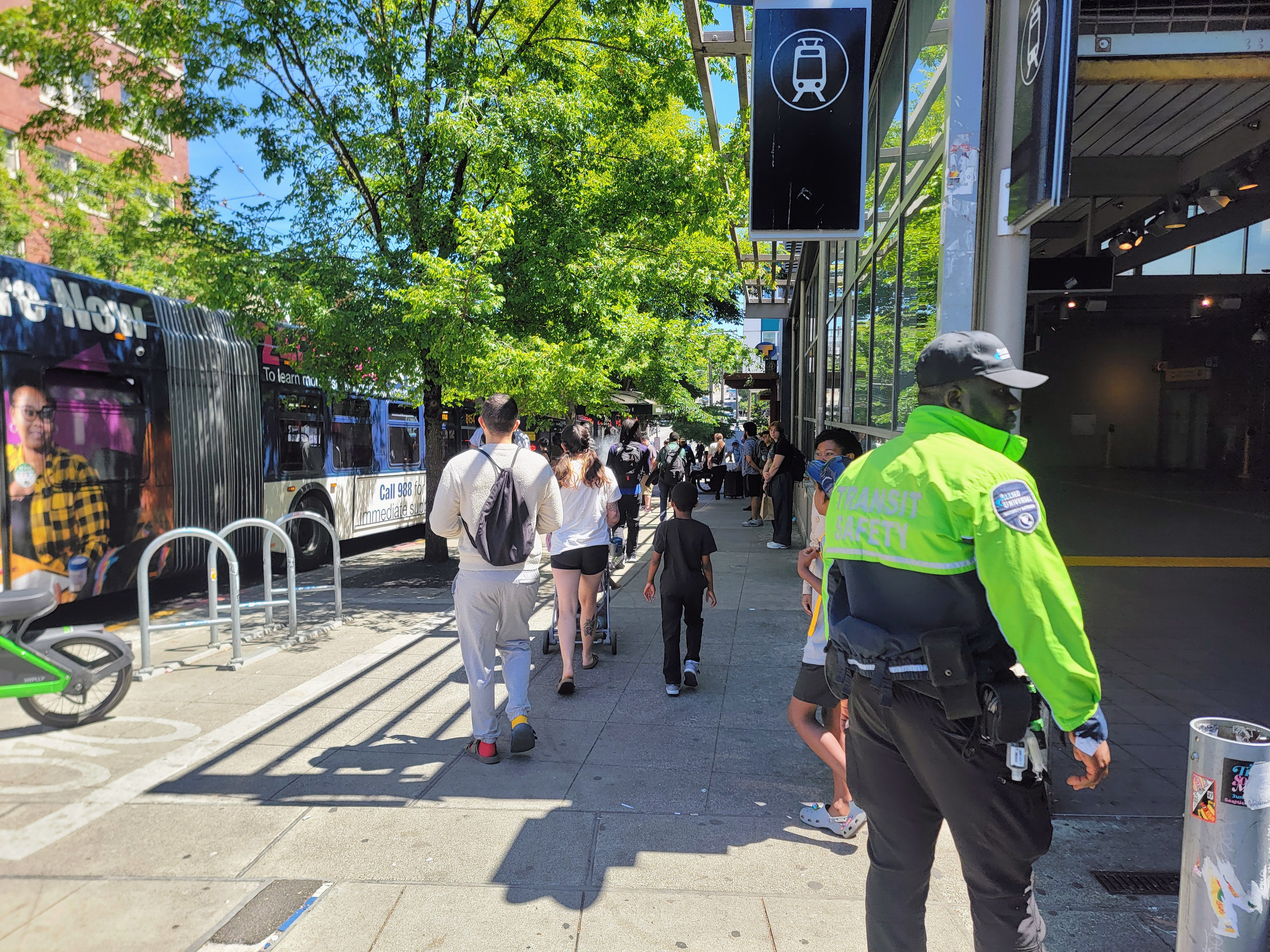 People line up to board shuttle buses at the Capitol Hill station during the daily light-rail closure on Thursday, July 9, 2026.