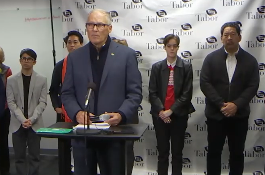 caption: Gov. Jay Inslee and Attorney General Bob Ferguson announced a handful of gun safety proposals they intend to pursue in the 2023 legislative session. They were joined by lawmakers, Seattle Mayor Bruce Harrell, and victims of gun violence in the state. 