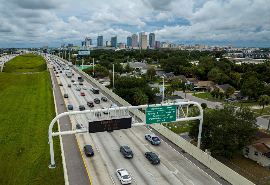 caption: Eastbound traffic crowds Interstate 275 as people evacuate before the arrival of Hurricane Ian in Tampa, Fla., on Tuesday.