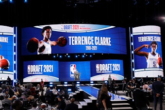 caption: NBA Commissioner Adam Silver gives a memorial in honor of Terrence Clarke on Thursday during the 2021 NBA Draft at the Barclays Center in New York City.