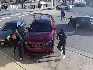 caption: In early December last year, a video captured part of a shootout and attempted carjacking. A retired firefighter died. Chicago police say one of the four suspects was 15 years old.