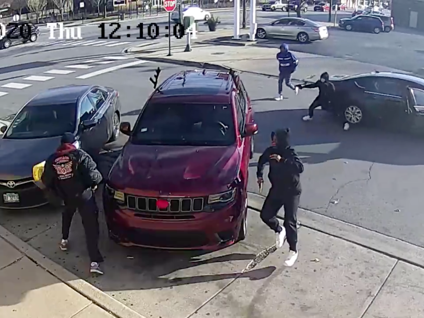 caption: In early December last year, a video captured part of a shootout and attempted carjacking. A retired firefighter died. Chicago police say one of the four suspects was 15 years old.