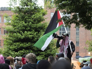 caption: Students protest the Israel-Hamas war at George Washington University in Washington, D.C., on Saturday. Protests and encampments have sprung up on college and university campuses across the country to protest the war.