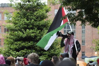 caption: Students protest the Israel-Hamas war at George Washington University in Washington, D.C., on Saturday. Protests and encampments have sprung up on college and university campuses across the country to protest the war.