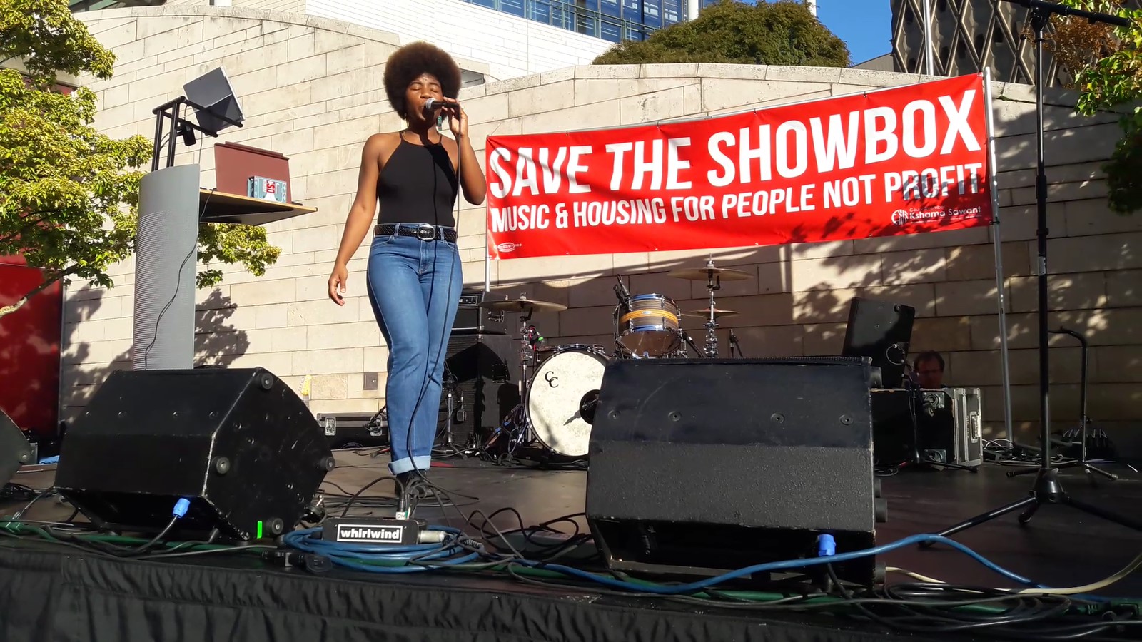 caption: Seattle-based SassyBlack was one of six acts that performed for the #SaveTheShowbox concert.
