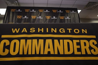 caption: The Washington Commanders football team's name and logo is seen at the NFL football team's facility in Ashburn, Va., on Nov. 10. A report Thursday by the U.S. House Committee on Oversight and Reform said the team created a "toxic work culture" for more than two decades, "ignoring and downplaying sexual misconduct" by men at the top levels of the organization.