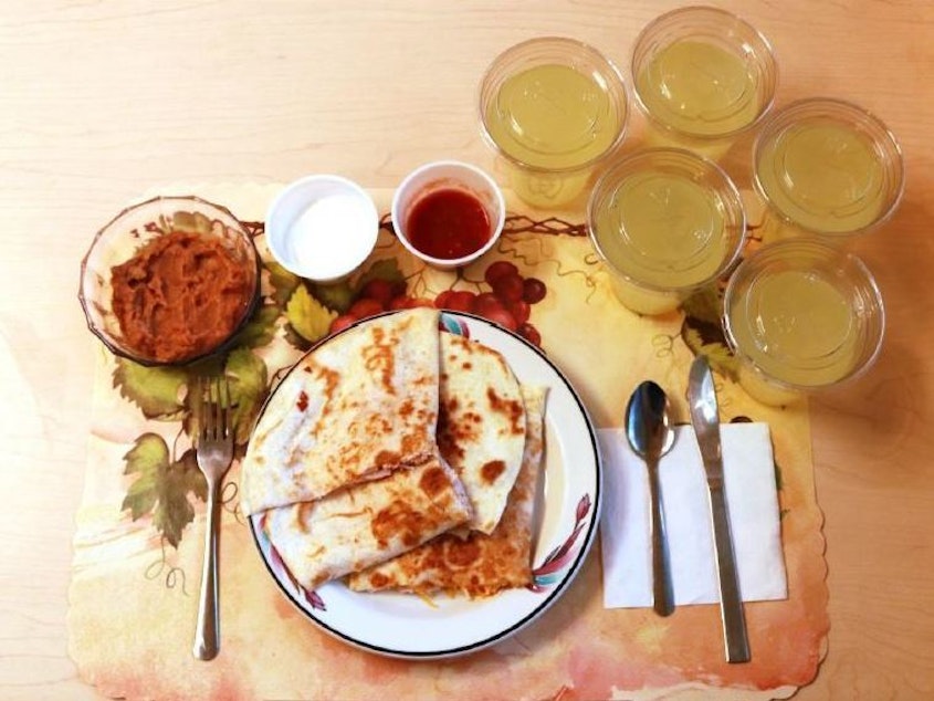 caption: An example of one of the study's ultra-processed lunches consists of quesadillas, refried beans and diet lemonade. Participants on this diet ate an average of 508 calories more per day and gained an average of 2 pounds over two weeks.