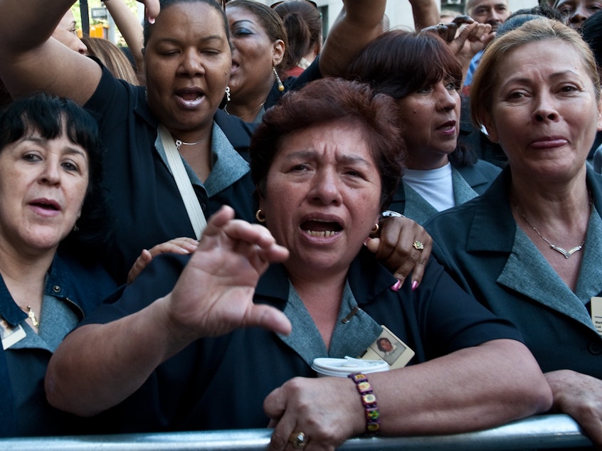 caption: Millions of jobs have evaporated, particularly from businesses that employ a large number of Hispanics — like hotels, restaurants, bars, building services.